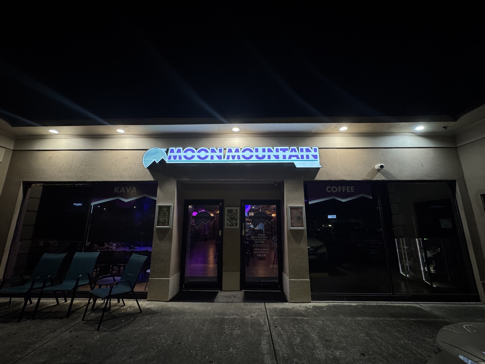 Moon Mountain kava bar and coffee shop storefront at night on S Kings Ave, Brandon FL